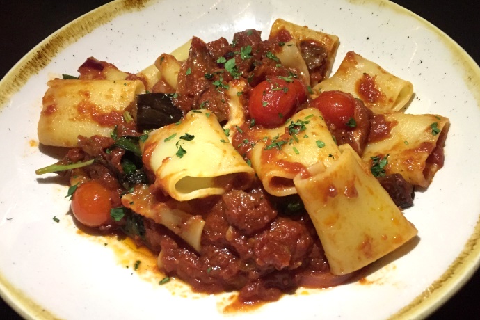 photo of paccheri with onion, garlic, eggplant, and smoked mozzarella from Brelundi Ristorante, Waltham, MA