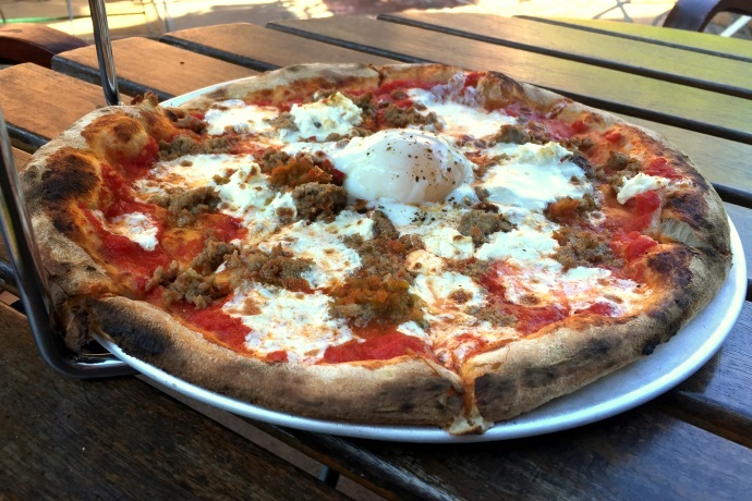 photo of sausage pizza with a slow-cooked egg from Brewer's Fork, Charlestown, MA