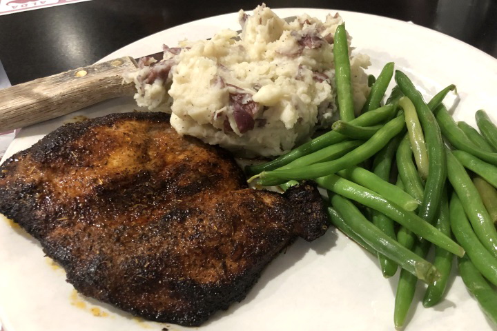 photo of blackened pork steak from Coop's Bar and Grille, Quincy, MA