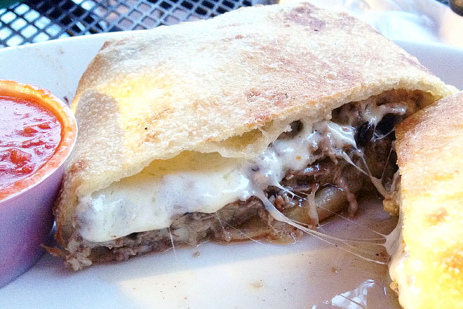 photo of steak and cheese calzone from Doyle's Pub and Grill, Brockton, MA