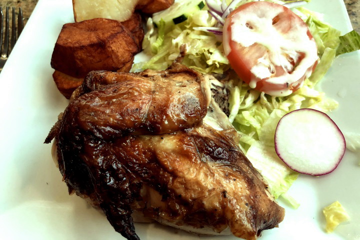 photo of charcoal quarter chicken from Machu Chicken, Somerville, MA