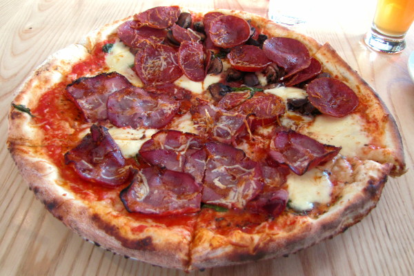 photo of coppa, pepperoni, and roasted wild mushroom pizza from When Pigs Fly Pizzeria, Kittery, ME